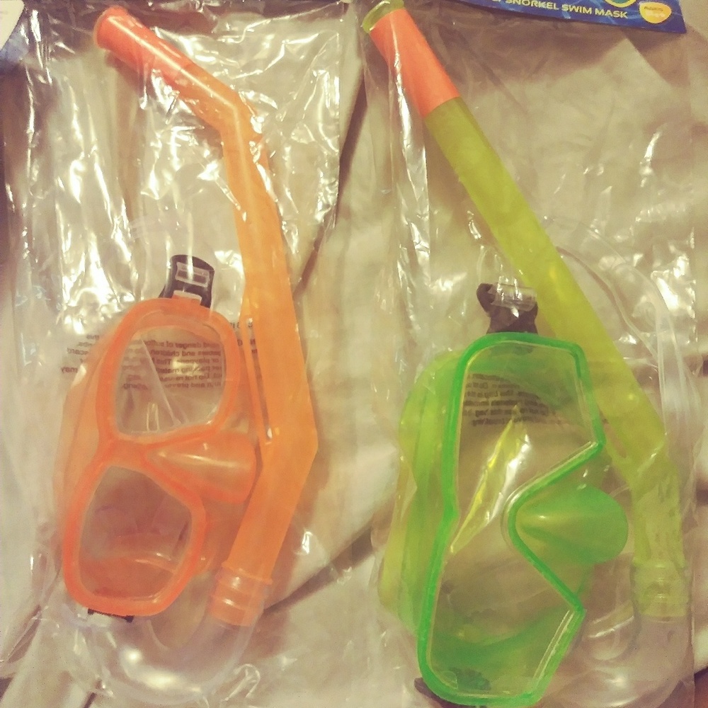 One pair each of kid and adult snorkel masks